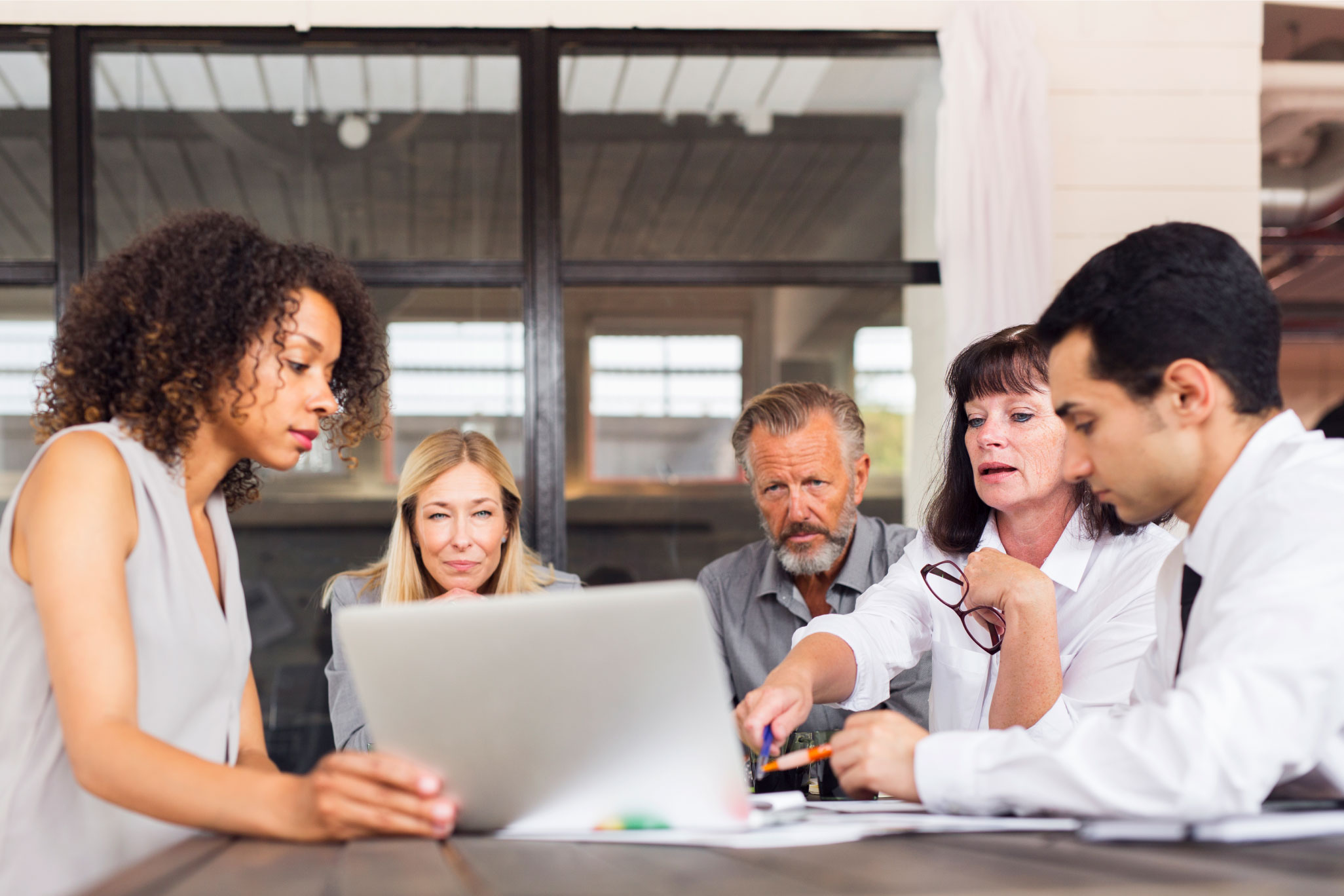 business-people-using-laptop-at-meeting-in-office-2022-02-02-03-56-12-utc